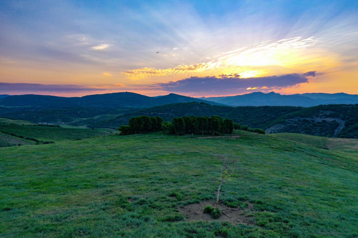 slash broken box ranch at sunset - how to finance land purchase